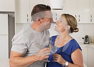 Young beautiful couple 30s or 40s in love celebrating together a photo