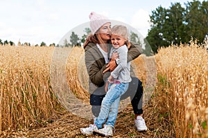 Young beautiful darkhaired woman with baby