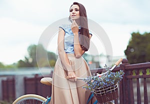 Young beautiful, elegantly dressed woman, summer and lifestyle