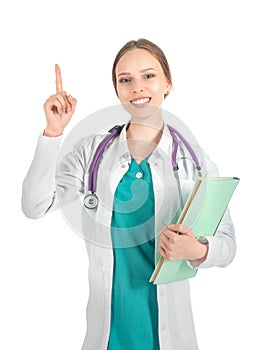 Young beautiful female doctor with stethoscope showing atention sign