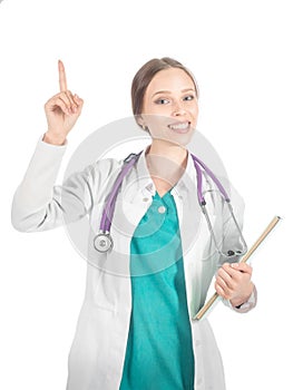 Young beautiful female doctor with stethoscope showing atention sign