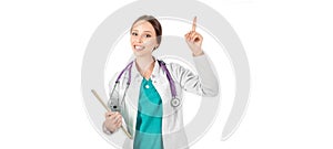 Young beautiful female doctor with stethoscope showing atention sign