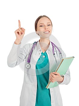 Young beautiful female doctor with stethoscope showing atention sign