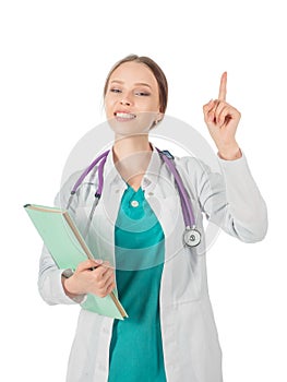 Young beautiful female doctor with stethoscope showing atention sign