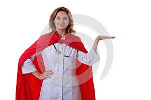 Young beautiful female hospital doctor superhero making presentation posture and showing open palm gesture face to camera isolated