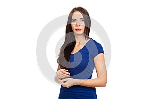 Young, beautiful girl in a blue t-shirt on a white background