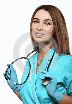 Young beautiful girl doctor with a stethoscope