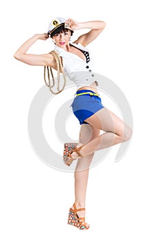 Young beautiful girl dressed as sailor