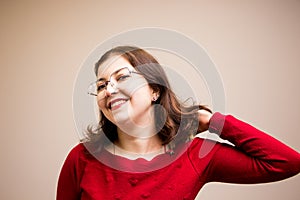 Young beautiful girl in glasses with her cute funny guinea pig