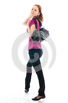 The young beautiful girl with a handbag isolated