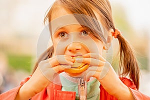 Young beautiful girl hold beef burger sandwich. Fast food concept