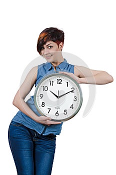 Young beautiful girl holding a large wall clock