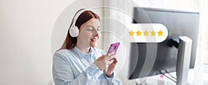 Young beautiful girl listening to music in wireless headphones. Business woman use smartphone for online shopping and