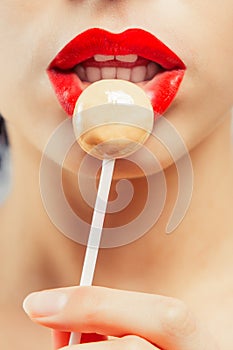 Young beautiful girl with lollipop her mouth