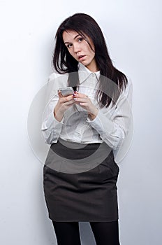 Young beautiful girl with office equipment