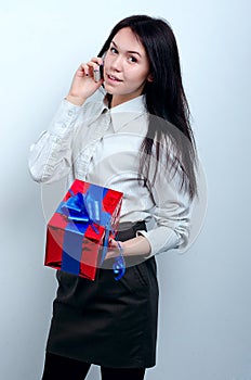 Young beautiful girl with office equipment