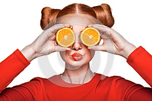 Young beautiful girl with orange.