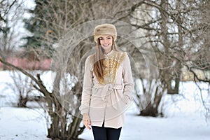 Young beautiful girl portrait in winter - outdoor