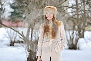 Young beautiful girl portrait in winter - outdoor