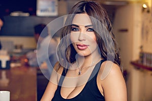 Young Beautiful Girl Posing in a Pub