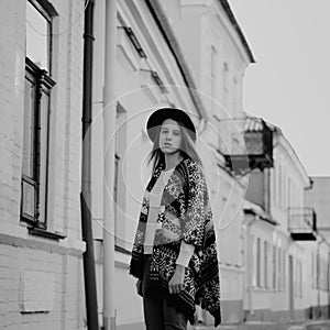 Young beautiful girl posing on the street