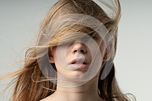 Young beautiful girl posing  in studio