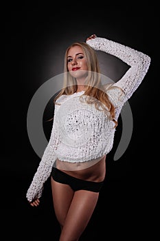 Young beautiful girl posing in studio