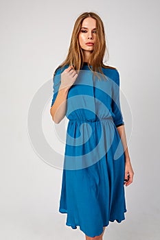 Young beautiful girl posing in studio