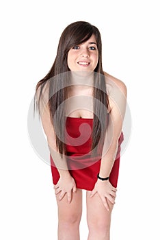 Young beautiful girl with red dress standing