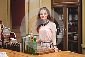 Young beautiful girl stands in kitchen in Italian style