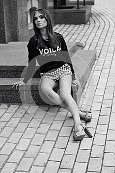 Young beautiful girl. Street fashion. Model shooting