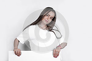Young beautiful girl teenager over white poster background.