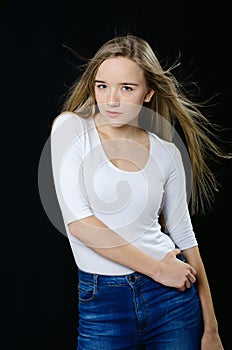 Young beautiful girl in turtleneck and jeans