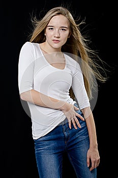 Young beautiful girl in turtleneck and jeans
