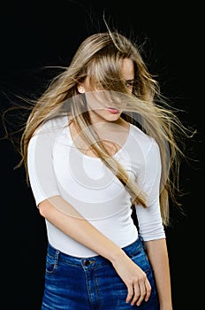 Young beautiful girl in turtleneck and jeans