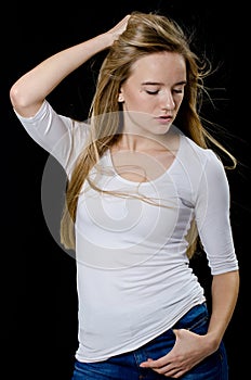 Young beautiful girl in turtleneck and jeans