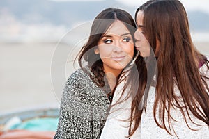 Young beautiful girlfriends portrait kiss