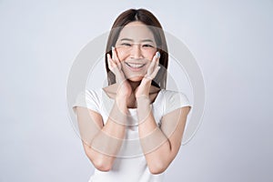 Young beautiful happy asian woman