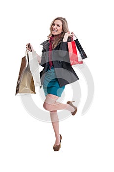 Young, beautiful and happy shopping lady