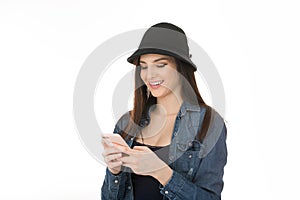 Young beautiful happy woman using smart phone