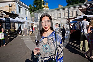 Young beautiful lady with glass of wine