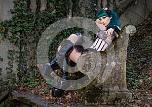 Young beautiful pin up glamour girl with green color hair, high