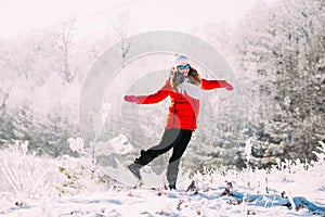 Young Beautiful Pretty Caucasian Girl Woman In Blue Sunglasses Dressed In Red Jacket And White Hat Smiling And Jumping