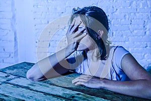 Young beautiful sad and depressed woman looking wasted and frustrated suffering pain and depression photo