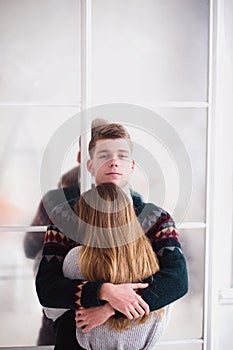 Young beautiful sensual couple indoor portraits