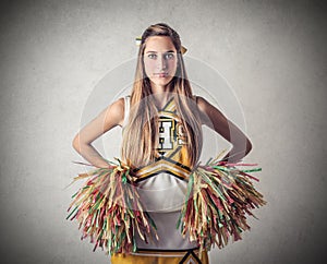 Young beautiful serious cheer-leader