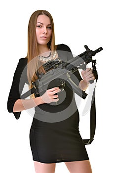 Young beautiful Woman holding Handgun in hand