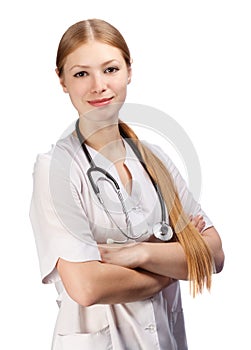 Young beautiful smiling blonde woman in white doctor`s smock wit