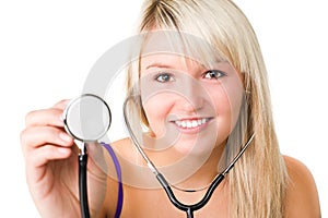 Young beautiful smiling girl with stethoscope