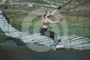 Young beautiful sportive girl runing. Girl is exercising. Outdoor sport. Beautiful strong sexy athletic caucasian fitness woman. Y